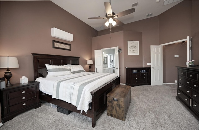 carpeted bedroom with a wall mounted AC, lofted ceiling, visible vents, and a ceiling fan