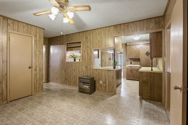 609 E Main, Omaha, TX 75571 - hallway featuring heating unit, wooden walls, and light floors