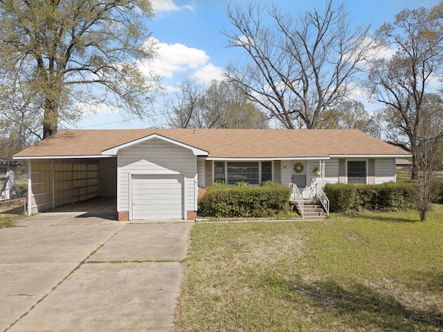 609 E Main, Omaha, TX 75571 - ranch-style home with a front lawn, an attached carport, a garage, and concrete driveway