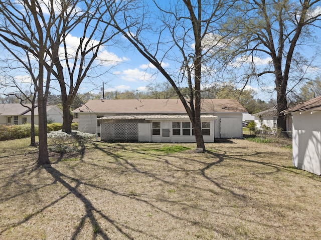 609 E Main, Omaha, TX 75571 - rear view of property with a lawn and fence
