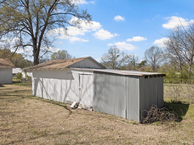 609 E Main, Omaha, TX 75571 - view of outdoor structure featuring an outdoor structure and fence