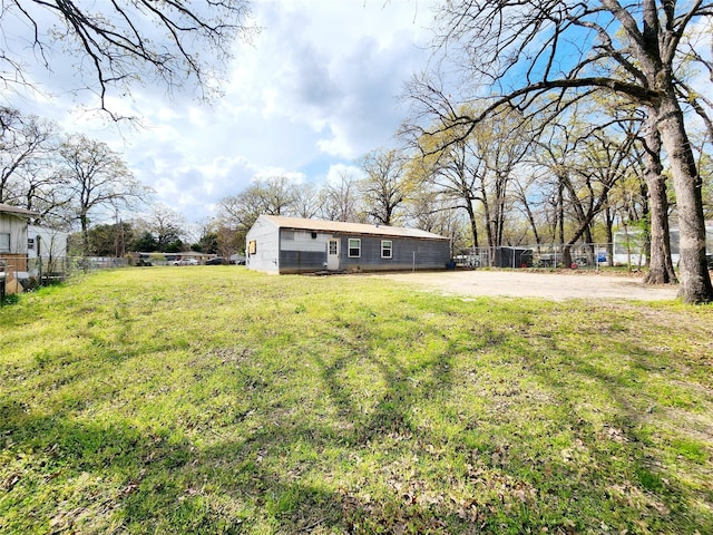 view of yard with fence