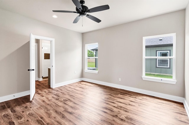 309 Pecan Ln, Tolar, TX 76476 - empty room featuring wood finished floors, baseboards, ceiling fan, and recessed lighting