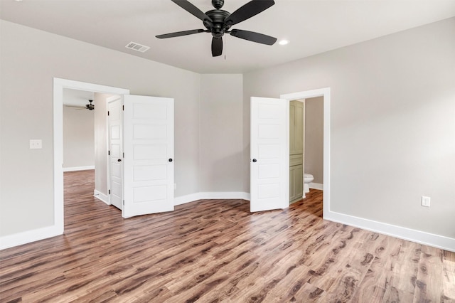 309 Pecan Ln, Tolar, TX 76476 - unfurnished bedroom with wood finished floors, baseboards, recessed lighting, and a ceiling fan