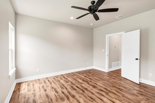 309 Pecan Ln, Tolar, TX 76476 - unfurnished room with wood finished floors, a ceiling fan, baseboards, and recessed lighting
