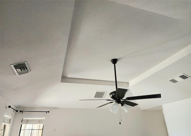 interior details featuring a ceiling fan and visible vents