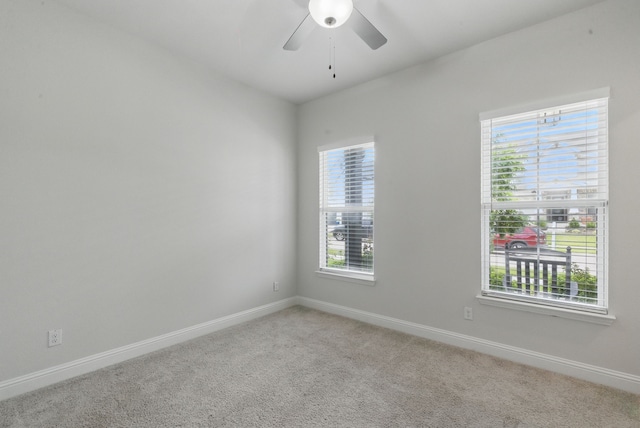 2205 Sandrellan St, Fort Worth, TX 76008 - spare room with light colored carpet, ceiling fan, and baseboards