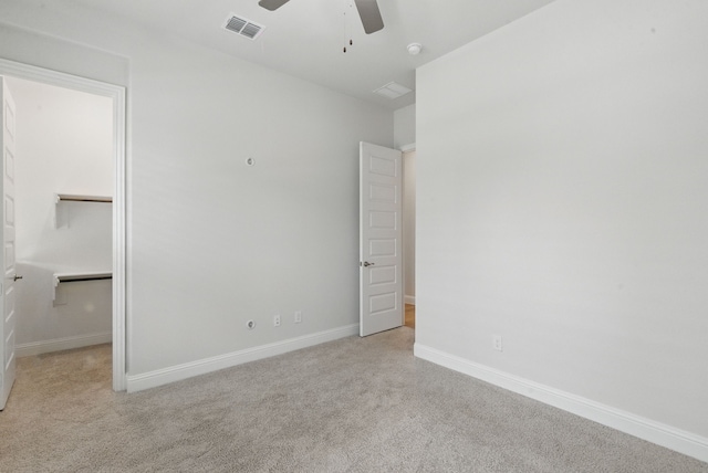2205 Sandrellan St, Fort Worth, TX 76008 - unfurnished bedroom with carpet floors, baseboards, a spacious closet, a ceiling fan, and a closet