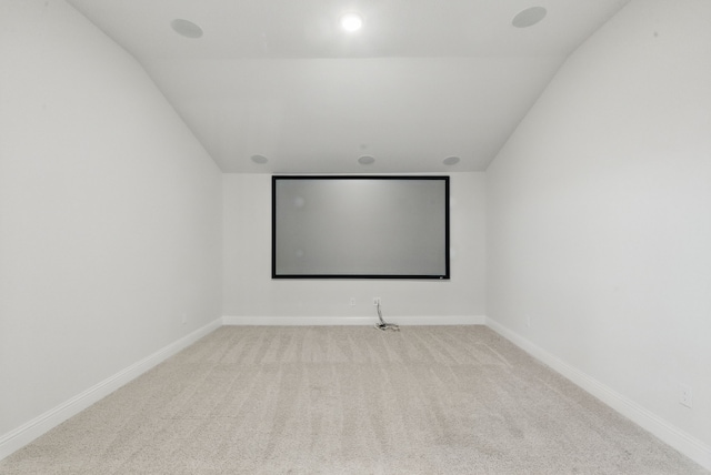 2205 Sandrellan St, Fort Worth, TX 76008 - home theater featuring lofted ceiling, carpet flooring, and baseboards