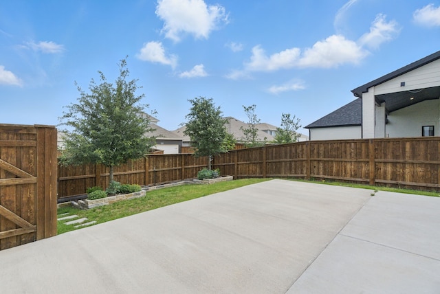 2205 Sandrellan St, Fort Worth, TX 76008 - fenced backyard with a patio