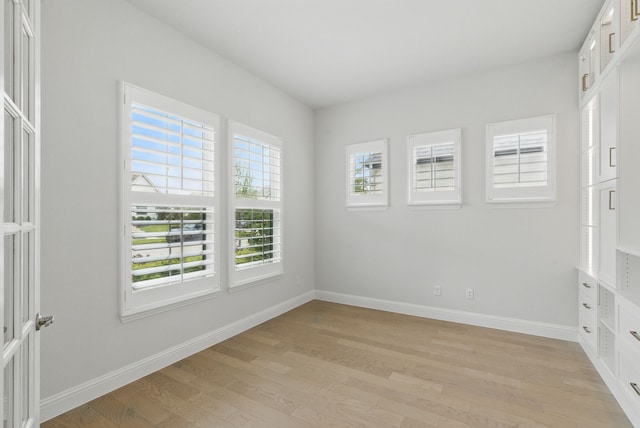 2205 Sandrellan St, Fort Worth, TX 76008 - unfurnished room with light wood finished floors and baseboards