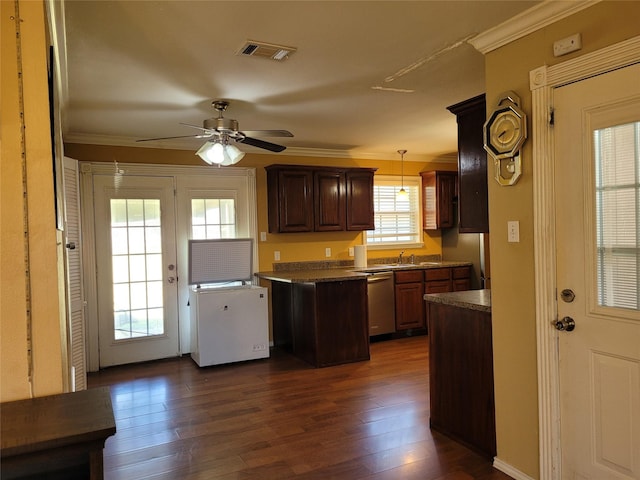 kitchen featuring dark countertops, crown molding, stainless steel dishwasher, and ceiling fan