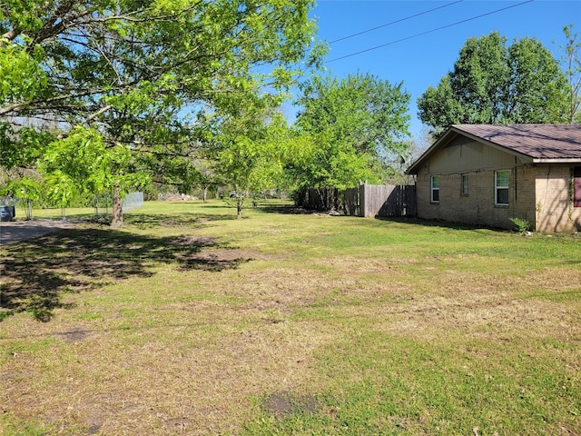 view of yard featuring fence