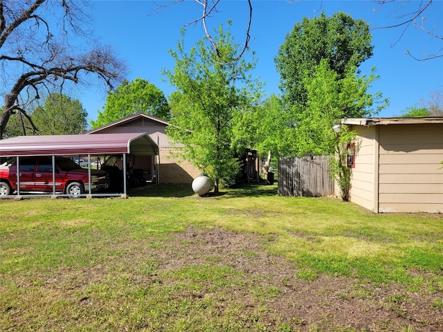 view of yard featuring a carport