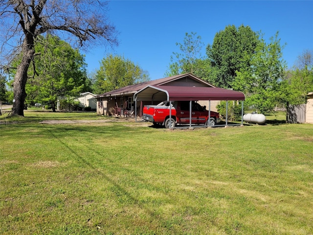 view of yard with a carport