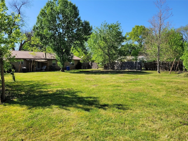 view of yard with fence