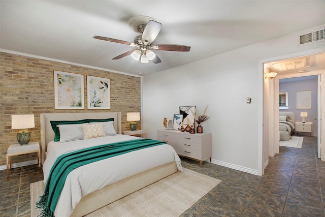 bedroom featuring visible vents, brick wall, a ceiling fan, and baseboards
