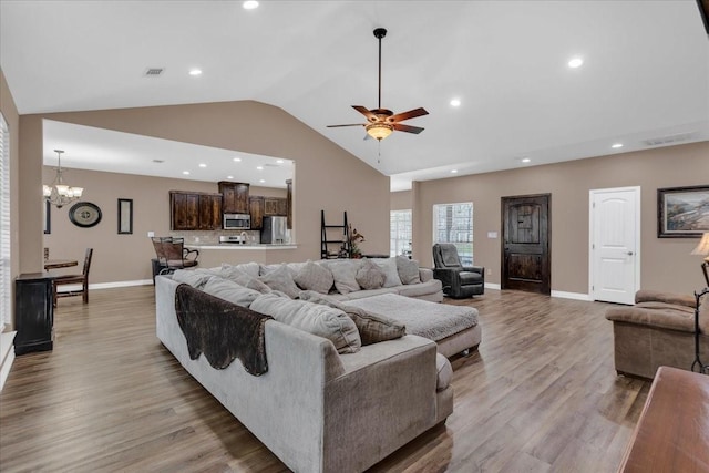 372 Private Road 123, Savoy, TX 75479 - living area with recessed lighting, ceiling fan with notable chandelier, baseboards, light wood finished floors, and visible vents