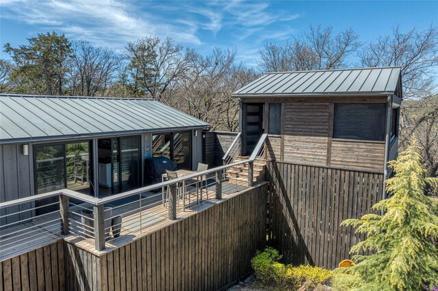 exterior space with a standing seam roof and metal roof