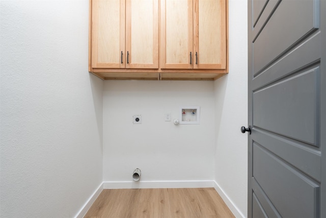laundry room with hookup for an electric dryer, light wood-type flooring, baseboards, cabinet space, and washer hookup