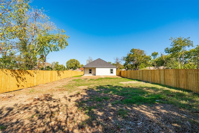 view of yard featuring a patio area and a fenced backyard