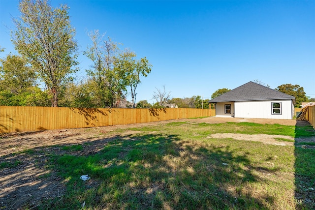 view of yard with a patio area and a fenced backyard