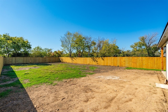 view of yard with a fenced backyard