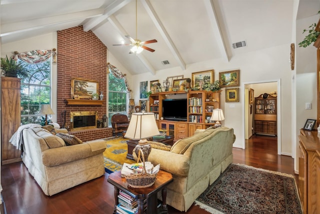7388 Wilderness Way, Weatherford, TX 76085 - living room with plenty of natural light, wood finished floors, a fireplace, high vaulted ceiling, and a ceiling fan