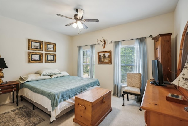 7388 Wilderness Way, Weatherford, TX 76085 - bedroom featuring light colored carpet and ceiling fan