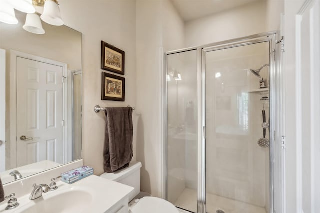 7388 Wilderness Way, Weatherford, TX 76085 - bathroom featuring a shower stall, vanity, and toilet