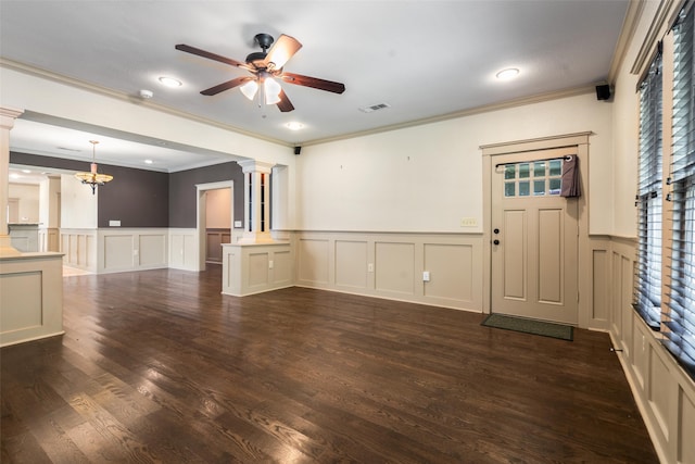 422 S Winnetka Ave, Dallas, TX 75208 - unfurnished living room with ornate columns, a decorative wall, a ceiling fan, wainscoting, and ornamental molding