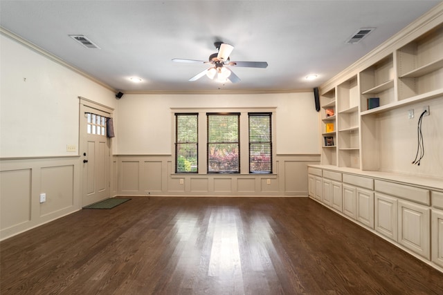 422 S Winnetka Ave, Dallas, TX 75208 - interior space featuring a ceiling fan, a decorative wall, crown molding, dark wood finished floors, and wainscoting