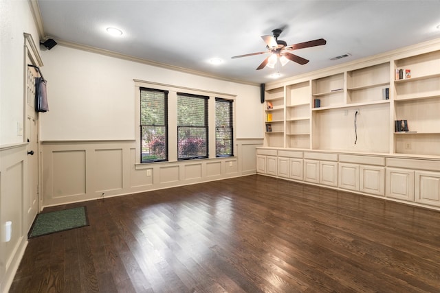 422 S Winnetka Ave, Dallas, TX 75208 - unfurnished room with a ceiling fan, ornamental molding, dark wood-style floors, wainscoting, and a decorative wall