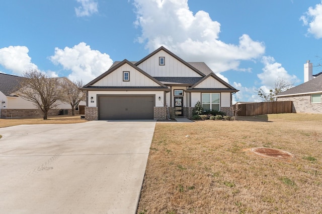 craftsman inspired home featuring fence, a front lawn, concrete driveway, board and batten siding, and a garage