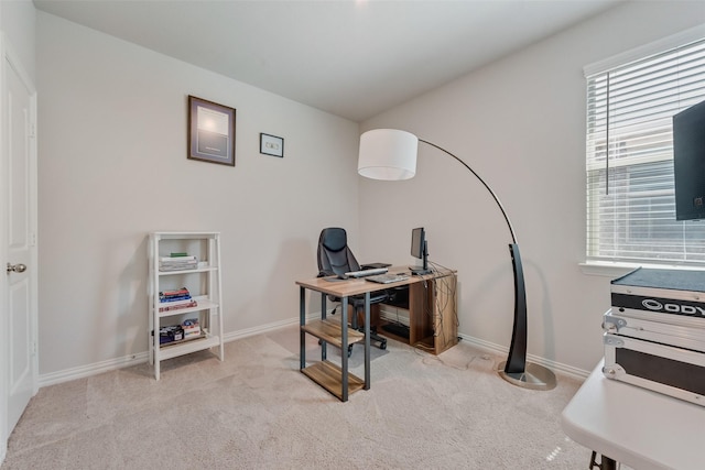 office featuring carpet and baseboards