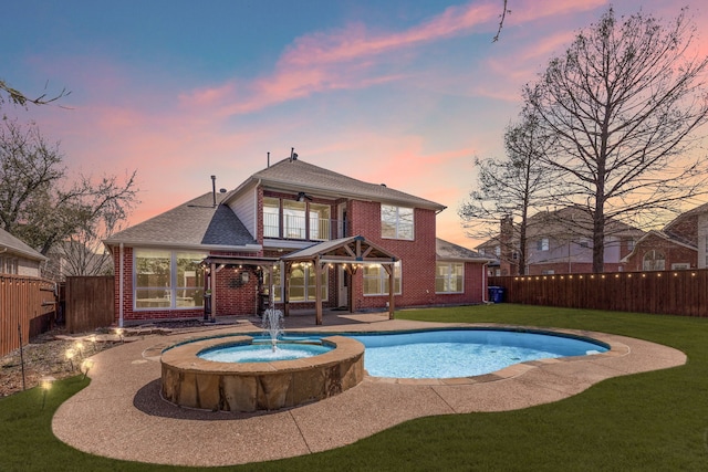 1908 Spring Blossom Ct, Mckinney, TX 75072 - view of swimming pool featuring ceiling fan, a patio area, and a pool with connected hot tub