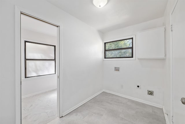 laundry room featuring washer hookup, baseboards, laundry area, and electric dryer hookup