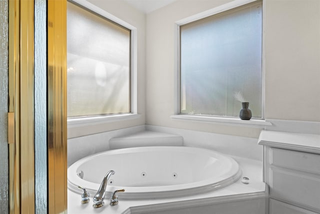 bathroom with a jetted tub