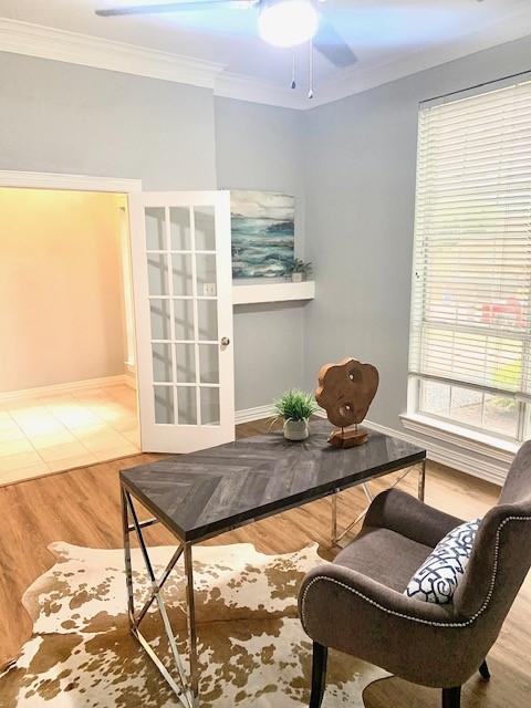 4726 Steeple Chase Ln, Rockwall, TX 75032 - home office featuring crown molding, ceiling fan, wood finished floors, and french doors