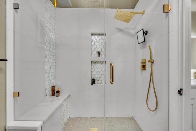 full bathroom with a tile shower