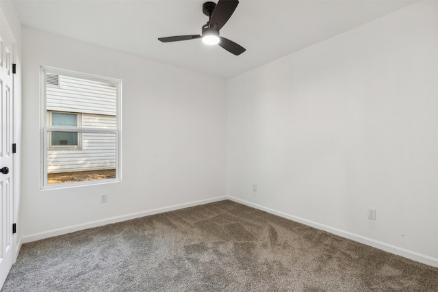 unfurnished room with baseboards, carpet flooring, and ceiling fan