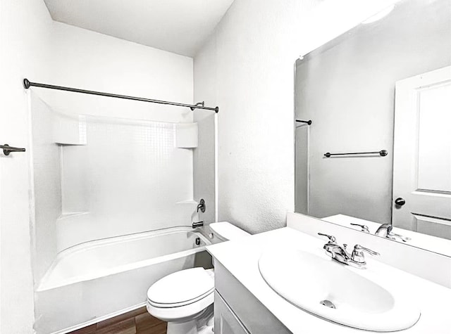 1637 Escondido Dr, Fort Worth, TX 76052 - full bathroom featuring bathtub / shower combination, toilet, vanity, and wood finished floors