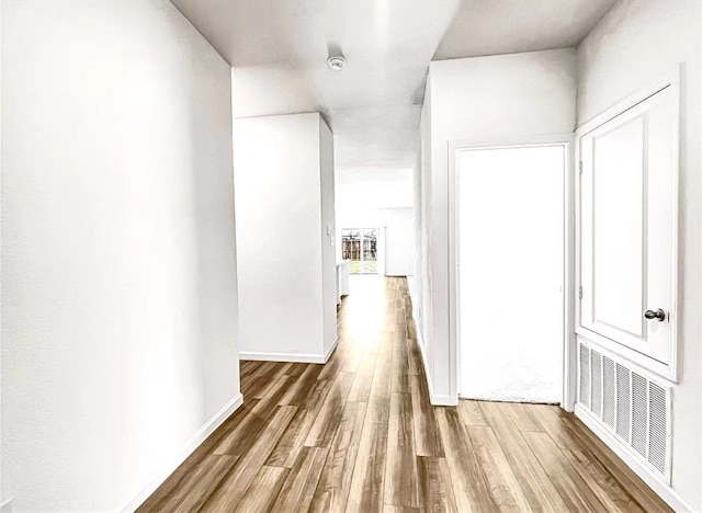 1637 Escondido Dr, Fort Worth, TX 76052 - hall featuring wood finished floors, baseboards, and visible vents