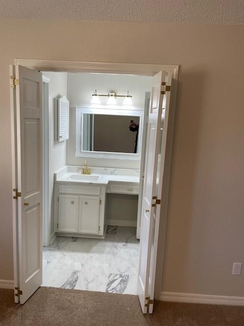3841 Meyers St, Shreveport, LA 71119 - unfurnished room featuring ceiling fan, light carpet, a textured ceiling, and baseboards