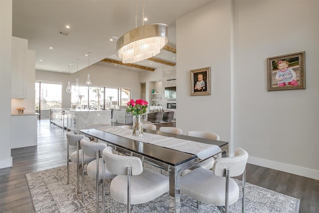 dining space with visible vents, baseboards, recessed lighting, and wood finished floors
