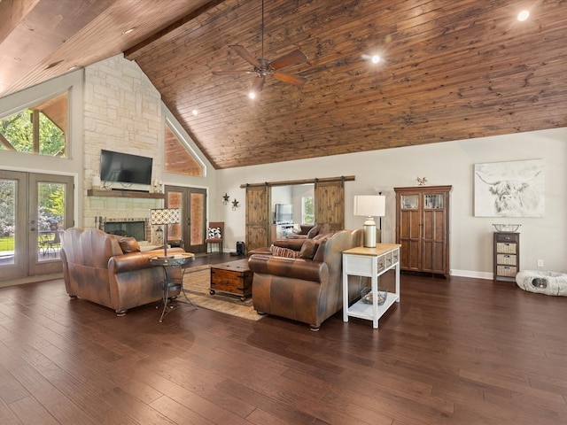 141 County Road 3481, Paradise, TX 76073 - living room featuring a ceiling fan, wood ceiling, a fireplace, high vaulted ceiling, and dark wood-style flooring
