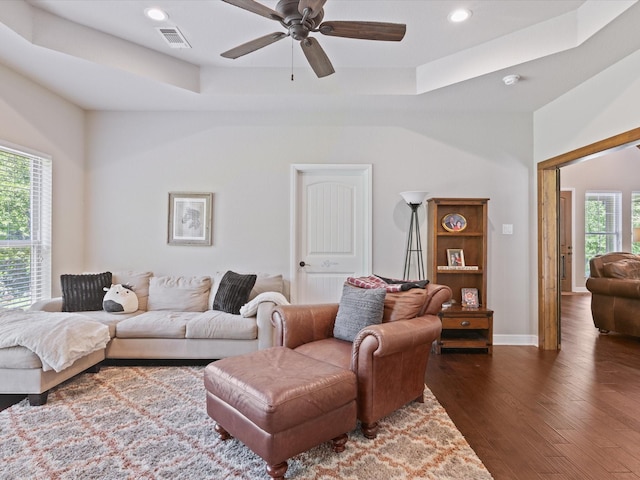 141 County Road 3481, Paradise, TX 76073 - living area featuring a ceiling fan, a raised ceiling, dark wood finished floors, visible vents, and recessed lighting