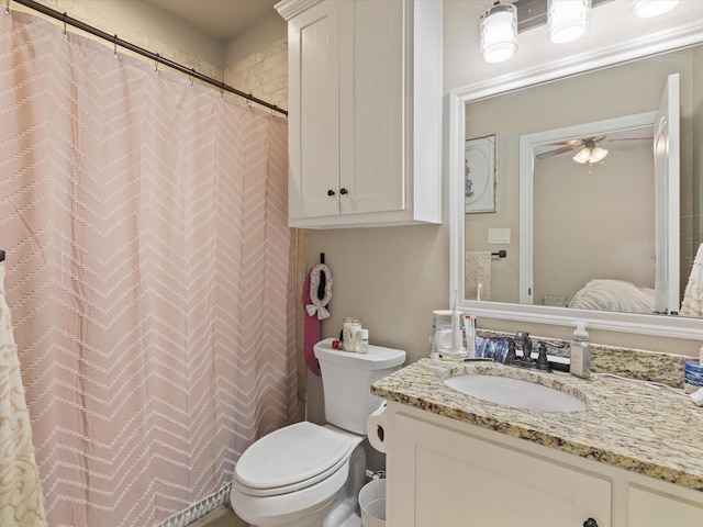 141 County Road 3481, Paradise, TX 76073 - bathroom featuring toilet, vanity, and curtained shower