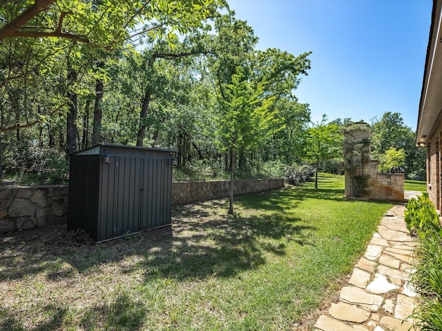141 County Road 3481, Paradise, TX 76073 - view of yard with fence, a storage unit, and an outbuilding