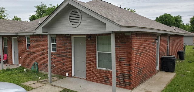 view of front of home with brick siding